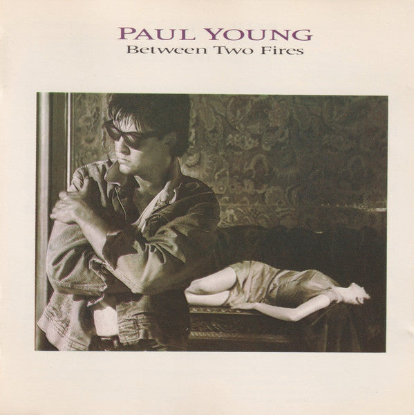 Paul Young – Between Two Fires