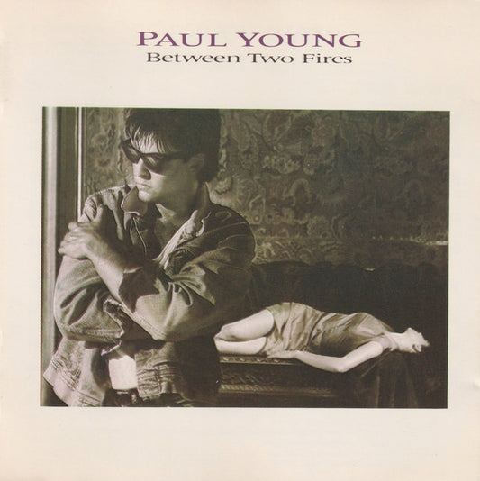Paul Young – Between Two Fires
